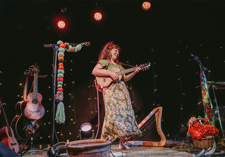 Mimi Bonsawin performing on stage